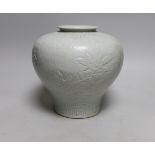 A Chinese moulded white glazed vase, early 20th century, 20cm