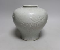 A Chinese moulded white glazed vase, early 20th century, 20cm