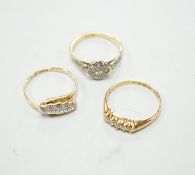 Three assorted 18ct and diamond cluster set rings including a late Victorian five stone diamond chip