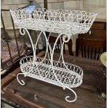 A painted wrought metal two tier pot stand, width 67cm, depth 27cm, height 70cm