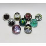 Nine Caithness paperweights including Arctic Night, limited edition 780/1500 and Sea nymphs, 114/