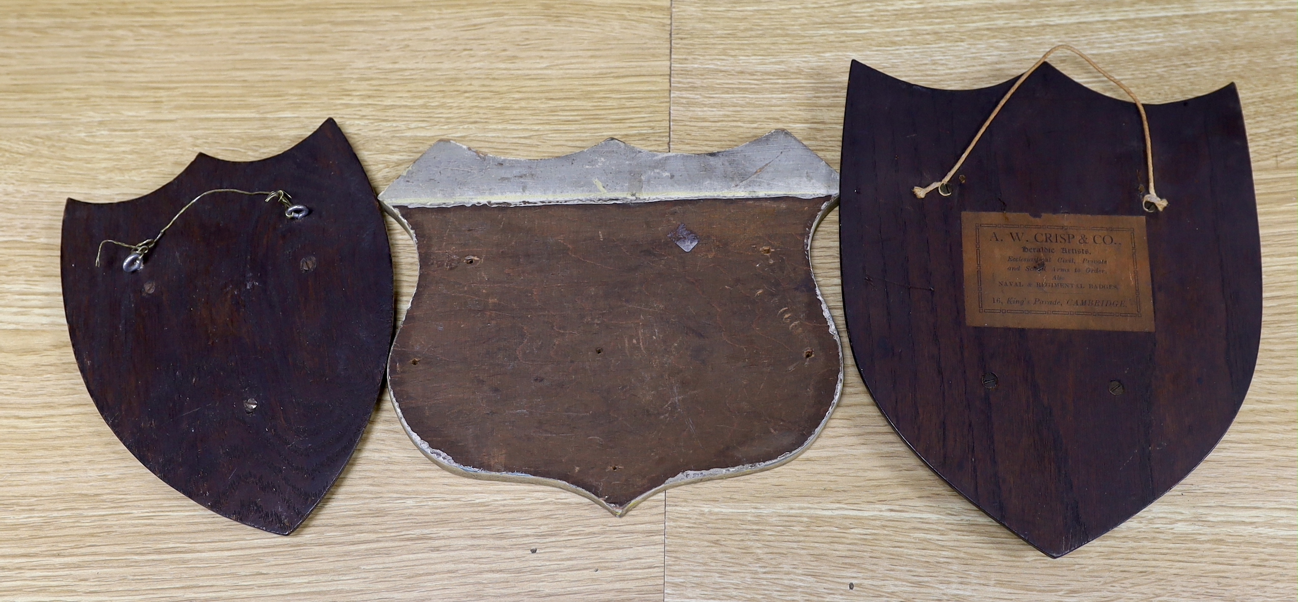 Three heraldic armorial shield shaped crests, one with Latin motto, In Deo Fidemus, the largest 24cm - Image 2 of 2