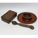 Treen including carved love spoon, four section box with incised decoration and a coaster, the