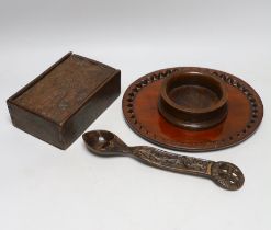 Treen including carved love spoon, four section box with incised decoration and a coaster, the