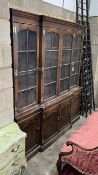 A reproduction oak breakfront library bookcase, length 186cm, depth 38cm, height 196cm