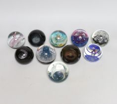 Ten Caithness paperweights including Viking Flame, limited edition 216/750 and Eterna, 175/500, each
