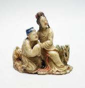 A Chinese soapstone carving - two figures, 19th/20th century, 9.5cm tall