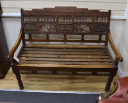 A Javanese carved hardwood bench, width 119cm, depth 65cm, height 98cm