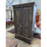A 19th century East European stained pine household cupboard, width 105cm, depth 50cm, height 182cm