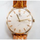 A gentleman's 1960's yellow metal Omega automatic wrist watch, movement c.552, on later associated