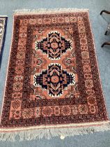 An Afghan red ground rug and a Bokhara gold ground rug, largest 180 x 121cm