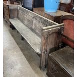 A Victorian oak pew, width 215cm, depth 45cm, height 86cm