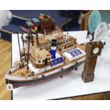 Two scratch built wooden model boats; a Mississippi style paddle steamer and a steam tug, together