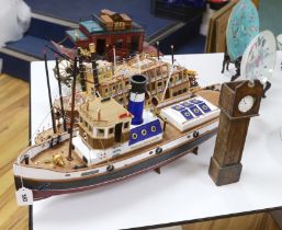 Two scratch built wooden model boats; a Mississippi style paddle steamer and a steam tug, together