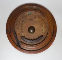 An early circular beech bagatelle board, 31cm diameter