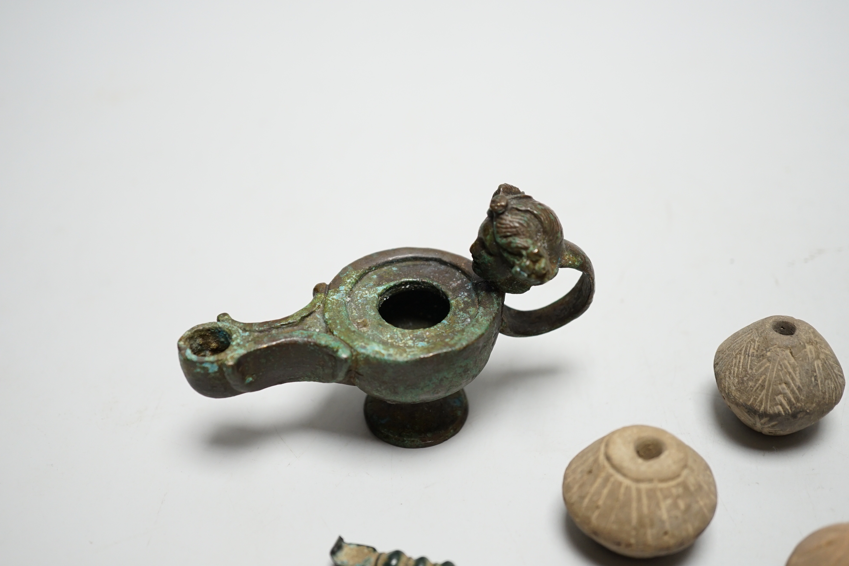 A collection of ancient bronze and terracotta items - Image 5 of 5