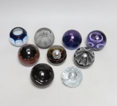 Nine Caithness paperweights including Ice Blossom, limited edition 419/1000 and Touchdown, 361/1000,