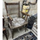 A 19th century Sussex elbow chair, width 52cm, depth 46cm, height 90cm