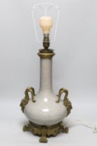 A crackle-glaze lamp with gilt mask design twin handles, 48cm high