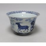 A Chinese blue and white footed bowl, decorated with animals in a landscape, 17cm in diameter