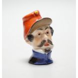 A Meissen bottle stopper or cane handle, modelled as a soldier’s head, 4.5cm