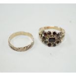 An early 19th century yellow metal, garnet and seed pearl cluster set ring, size P and a 19th