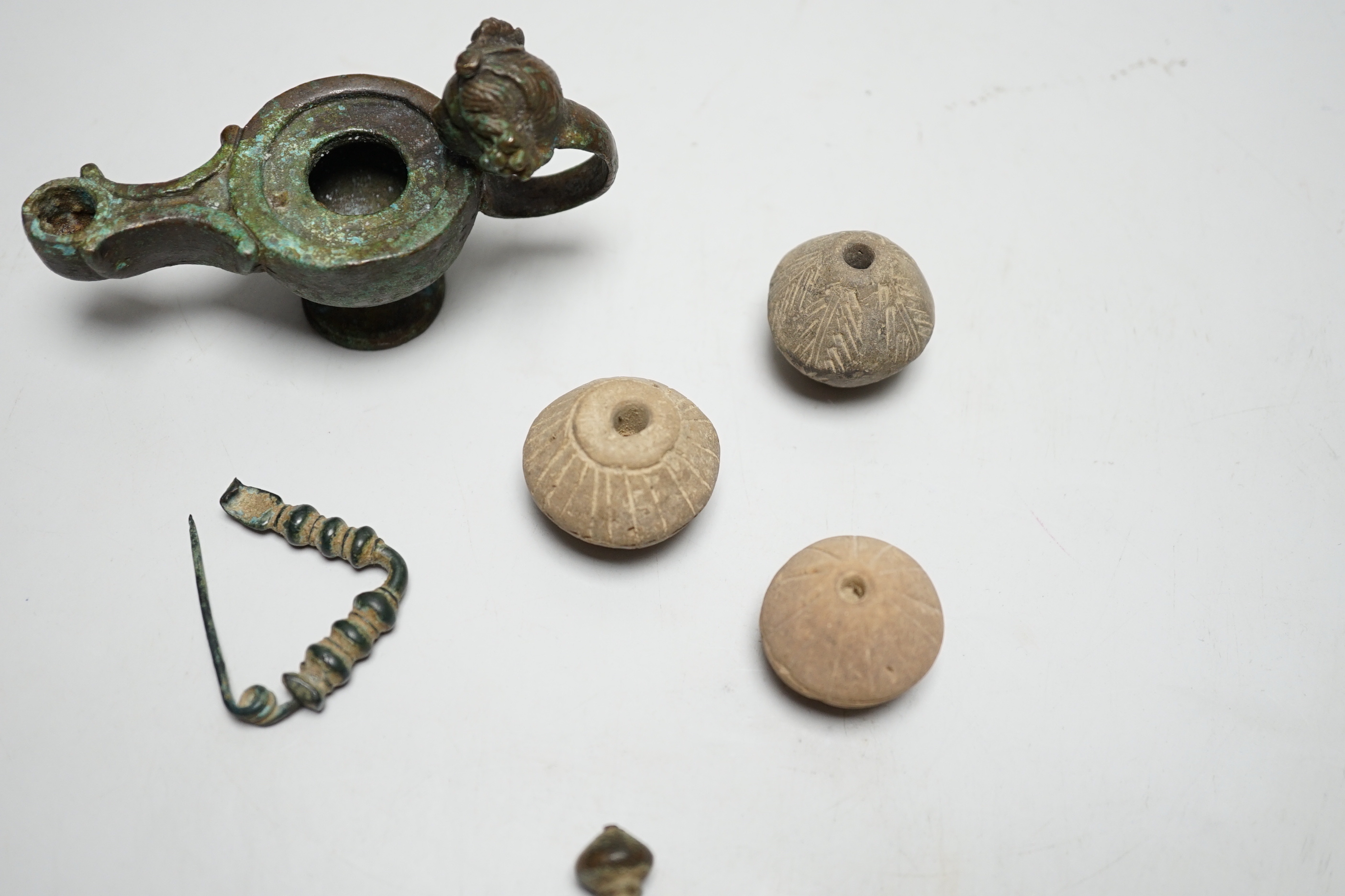 A collection of ancient bronze and terracotta items - Image 4 of 5
