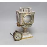 A late 19th century Meissen clock of square form with Watteau scenes and lion mask handles, top