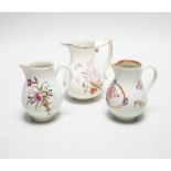 Two Worcester flower painted sparrow-beak jugs, c.1780 and an English porcelain milk jug, c.1825 (