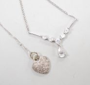 Two modern white metal (stamped 375) and gem set pendant necklaces, including a diamond chip set