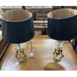 A pair of contemporary brass and clear glass tripod table lamps, height including shades 60cm