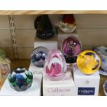 Nine Caithness paperweights, boxed, some limited edition