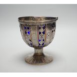 A Victorian pierced silver pedestal sugar basket, by John Samuel Hunt, London, 1859, with blue glass