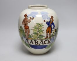 A Delft tobacco jar hand-painted with two figures, 28cm high