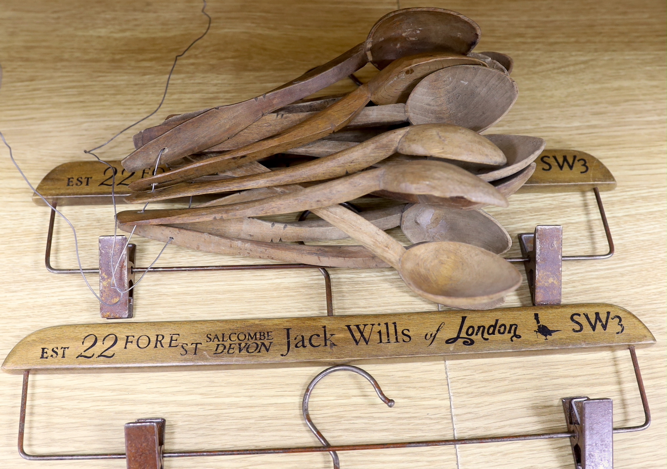 A quantity of Victorian carved wood spoons and four Jack Wills clothes hangers - Image 2 of 3