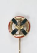 An early 20th century yellow metal and Scottish hardstone set stick pin, with St Andrew's cross