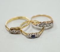 Two 18ct rings including illusion set three stone diamond and sapphire and diamond three stone and a