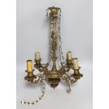 Two gilt metal chandeliers, one with crystal drops, the largest 52cm high