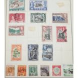 A stamp album with various stamps