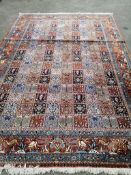 A Baktiari floral carpet, approx. 360 x 240cm