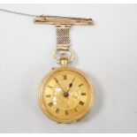 An early 20th century 18ct gold open face fob watch, with Roman dial, on a 9ct suspension brooch,