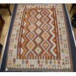 A Kilim polychrome geometric carpet, 250 x 177cm