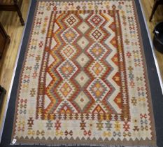 A Kilim polychrome geometric carpet, 250 x 177cm