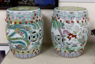 A pair of Chinese famille rose ‘Hundred bird’ garden seats, 37cm high