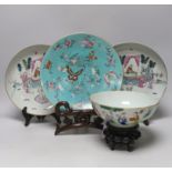 A pair of Chinese famille rose dishes painted with court scenes, a similar enamelled butterfly