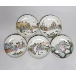 A set of five Chinese enamelled porcelain saucer dishes, decorated with figures and elders, each
