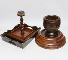 A pincushion stand with tray base, a mahogany vase stand and a hardwood mortar, tallest 22cm high