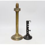 A Palmer & Co. brass lamp and an ejector candlestick, tallest 35cm