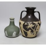 Attributed to Wedgwood, a jasper ware copy of the Portland vase, unmarked and a Wedgwood