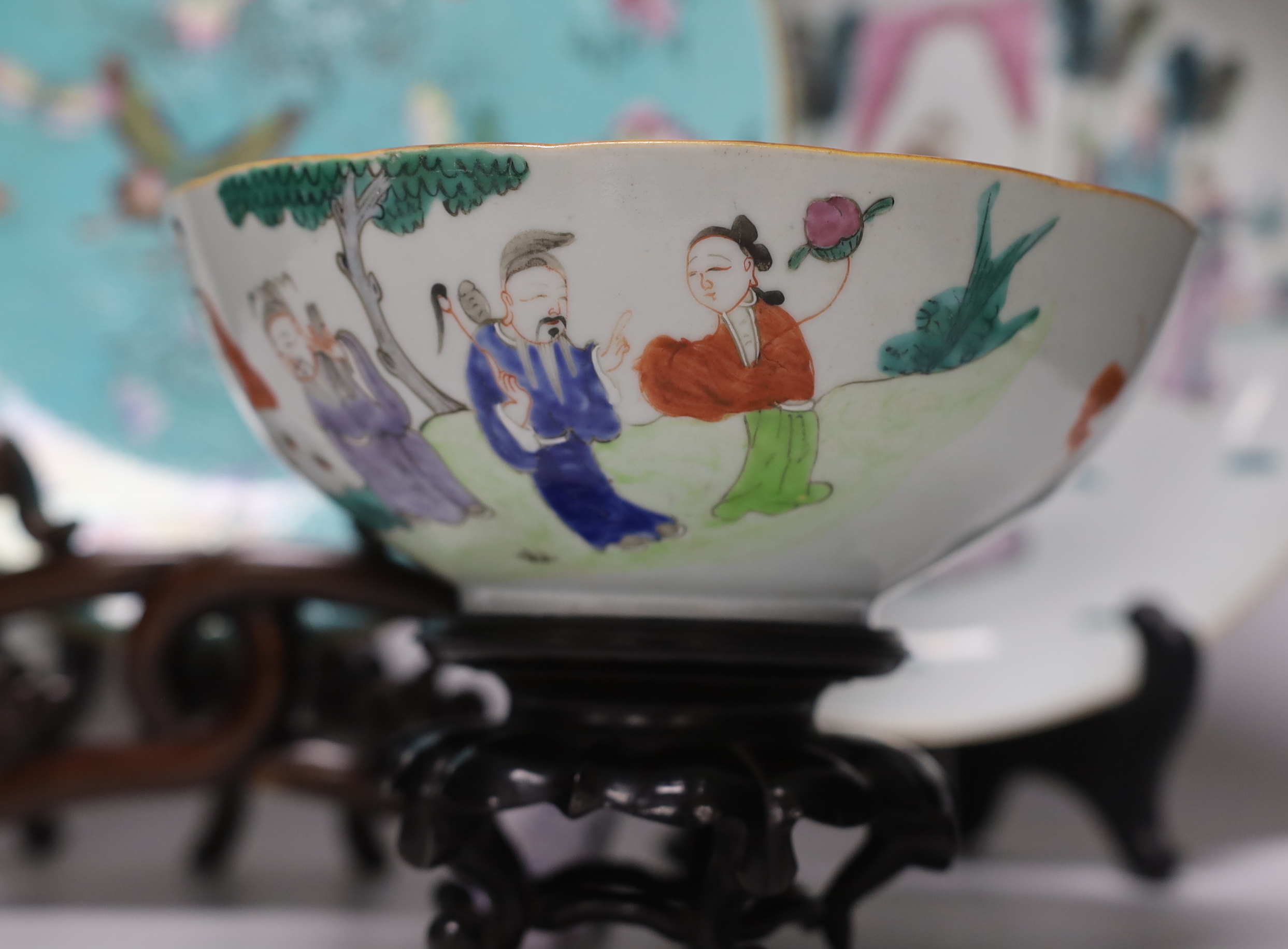 A pair of Chinese famille rose dishes painted with court scenes, a similar enamelled butterfly - Image 2 of 6